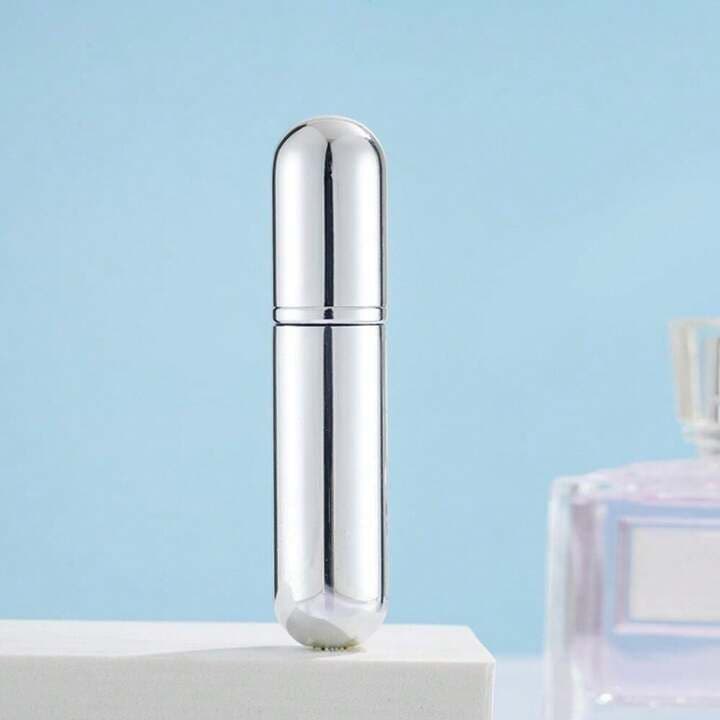 Refillable perfume spray
